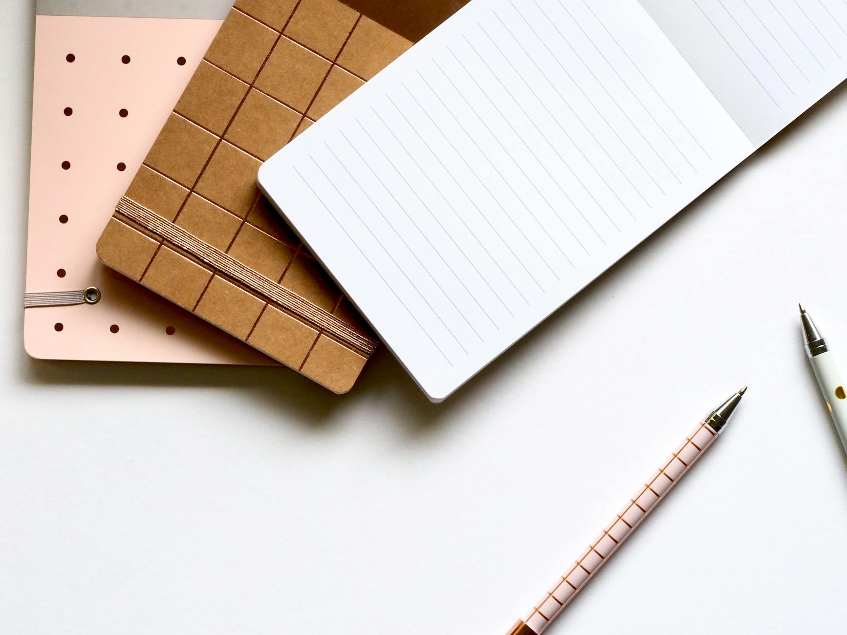 pad with pens on table