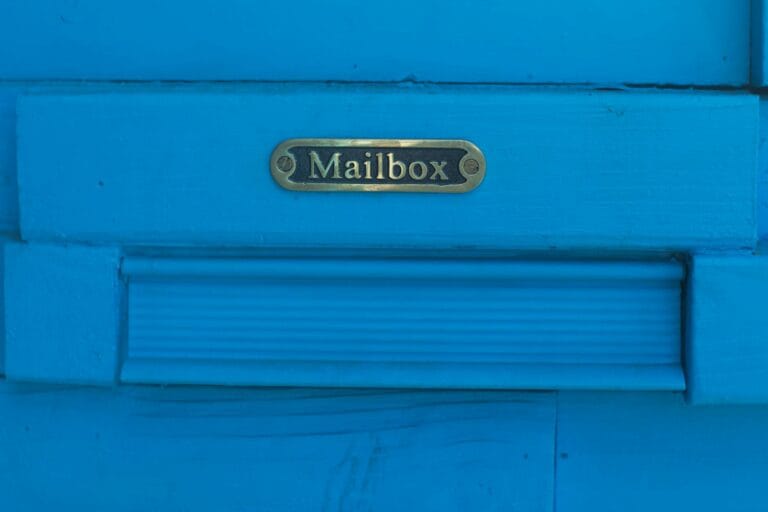 mailbox metal sign blue painted wooden wall