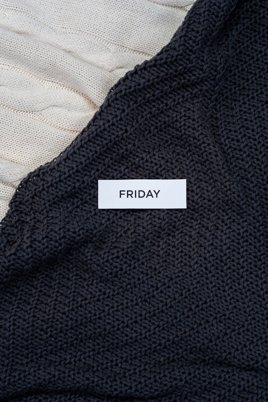 black textile on white textile