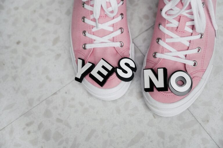 pink and white sneakers