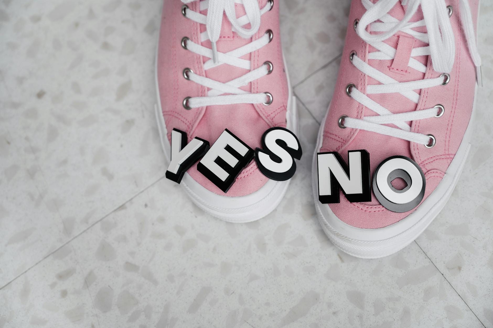 pink and white sneakers