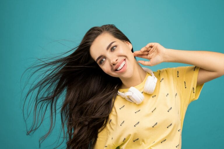 photo of woman wearing yellow shirt