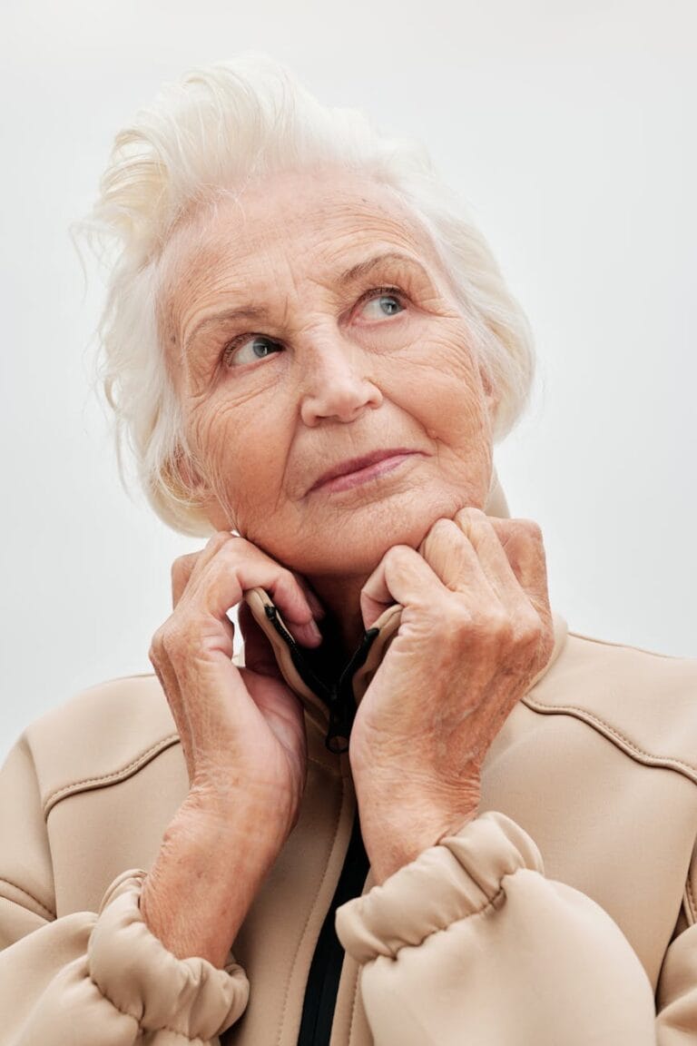 elderly woman wearing a jacket