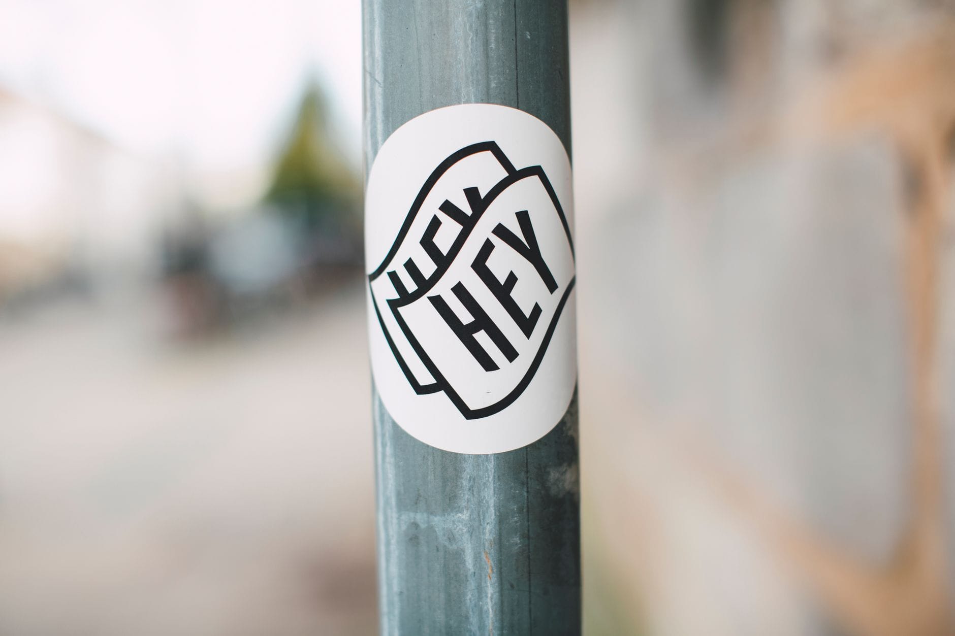 black and white sticker on metal post