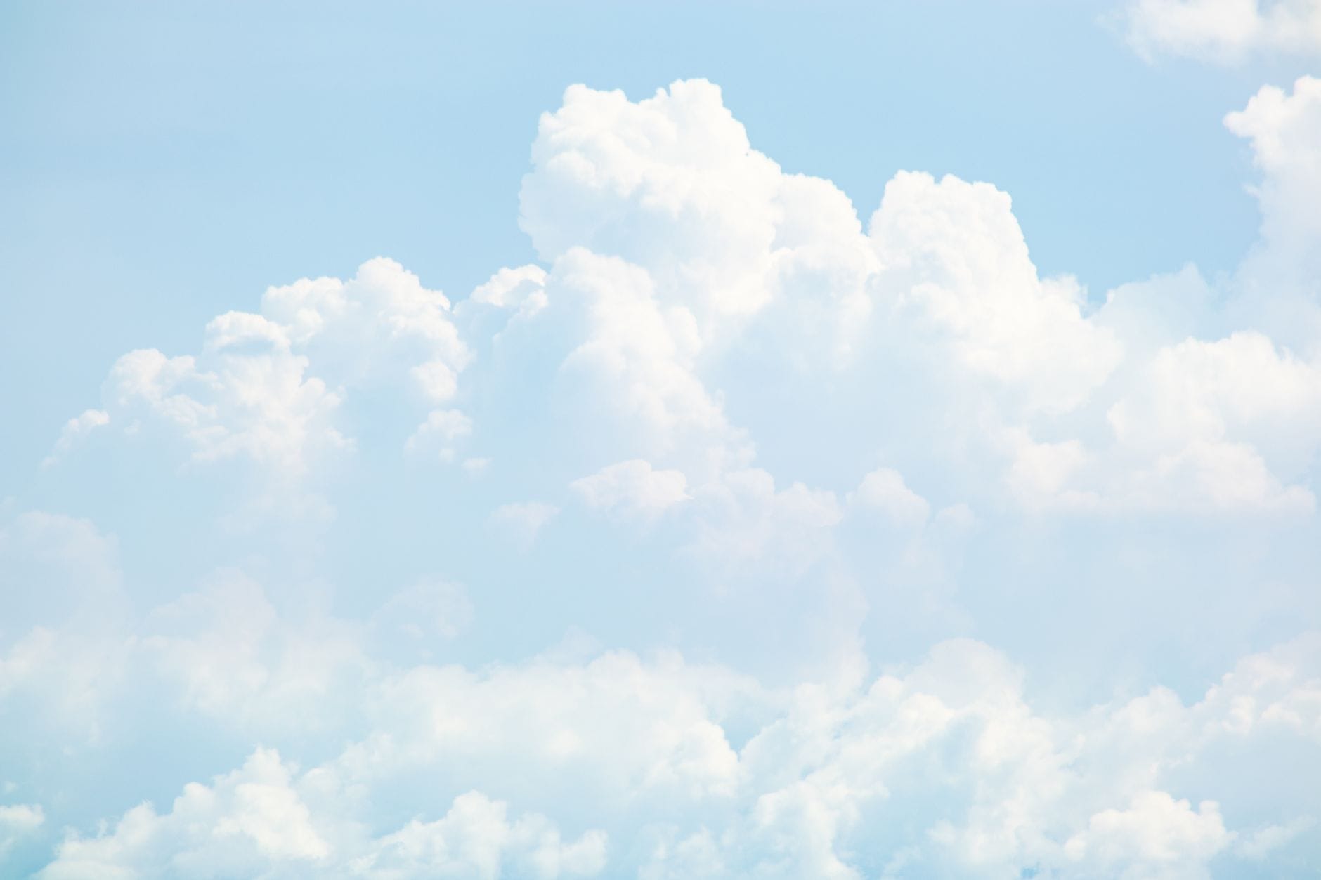white clouds across the sky