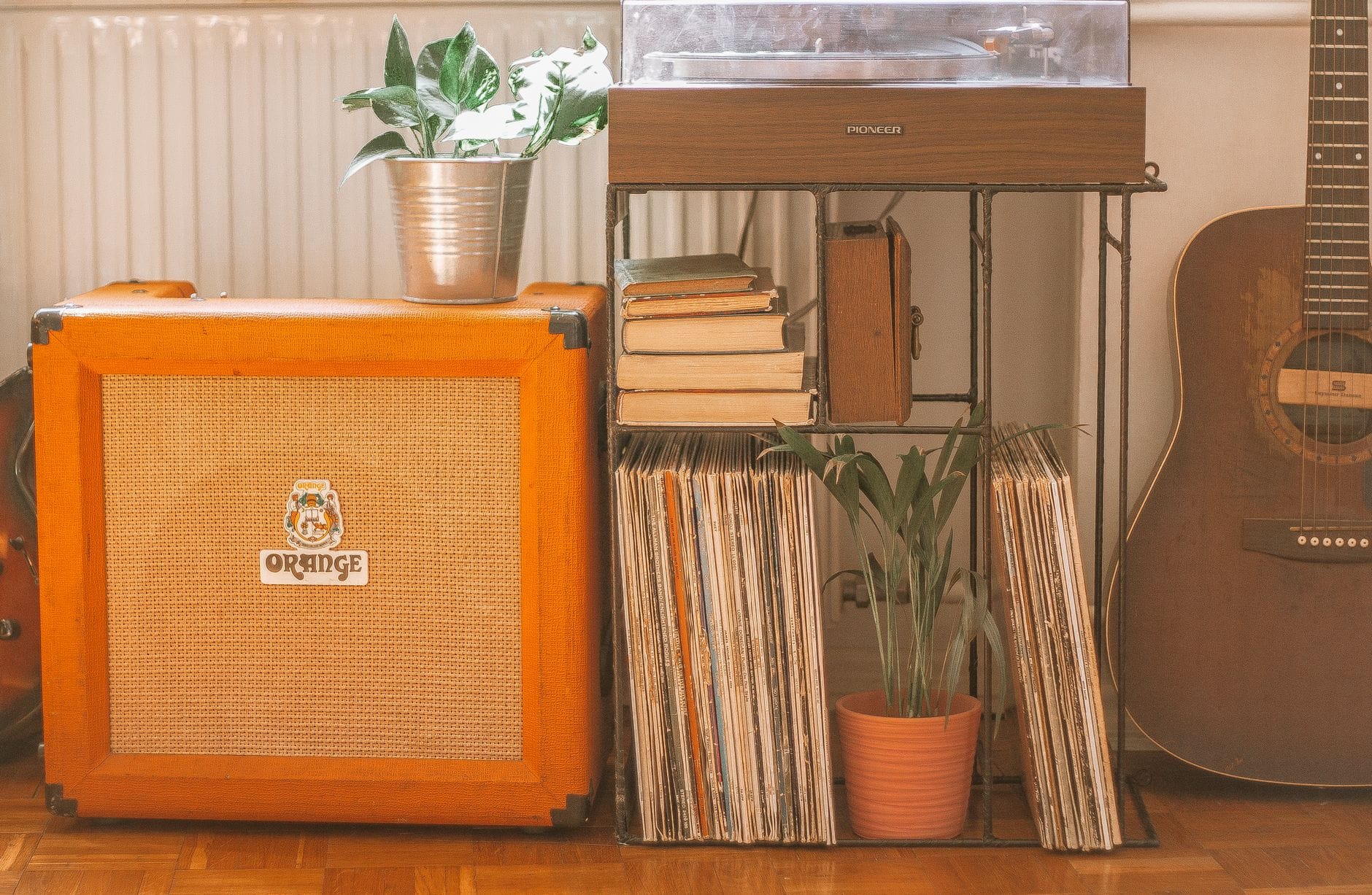 orange wooden box and stand for vinyl